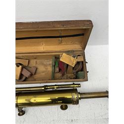 19th century brass reflecting telescope by Dring & Fage, London, the cylinder with inter-changable eyepieces and mounted with sighting scope, contained within wooden box, cylinder diameter 4.5in, length (without lens) 52in 