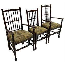 Set of six (4+2) 20th century oak spindle back dining chairs, with upholstered drop-on seat cushions, turned supports joined by turned stretchers