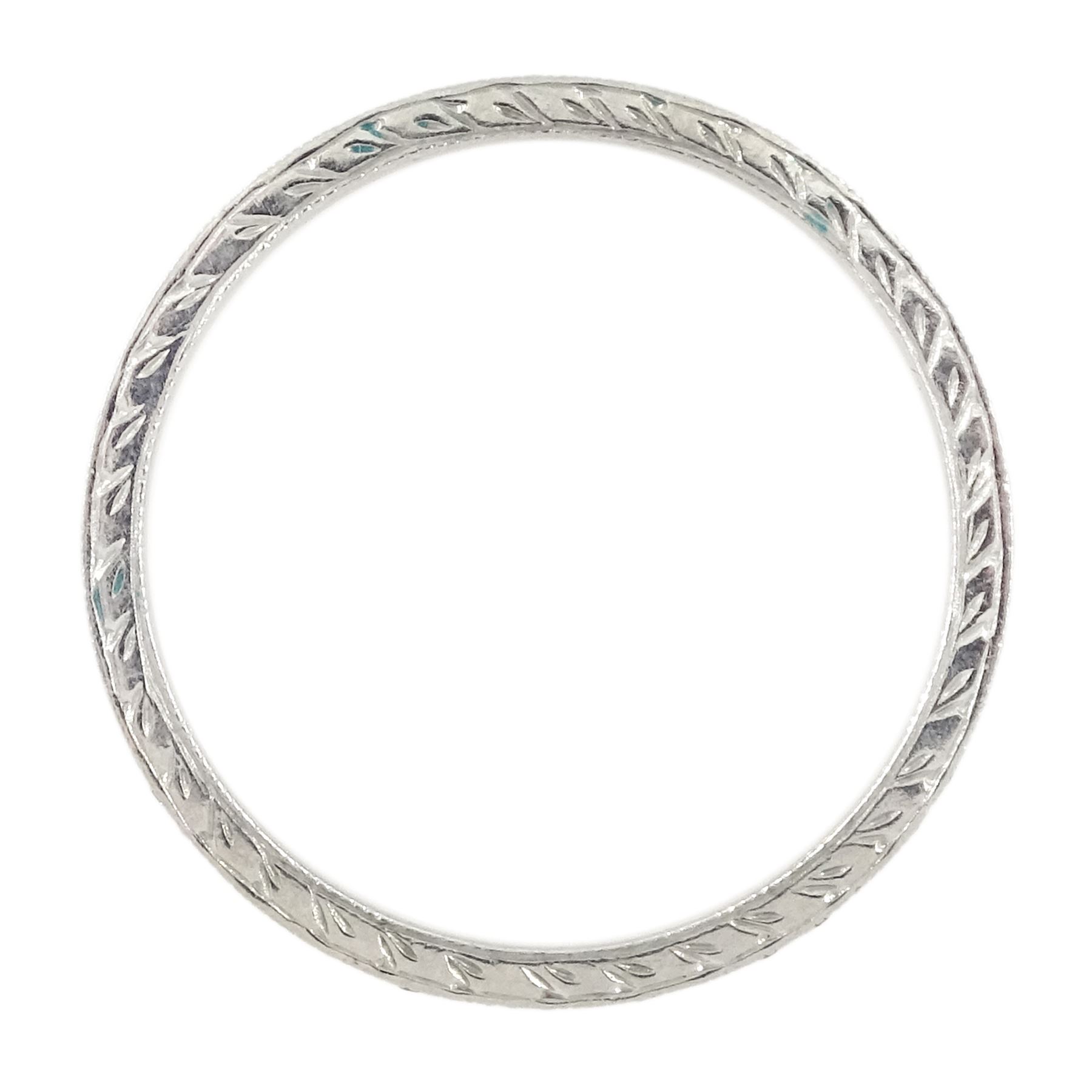 Platinum diamond full eternity ring, the sides with engraved decoration