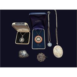 Three Wedgwood Jasperware pendant necklaces, a silver locket necklace and two silver brooches