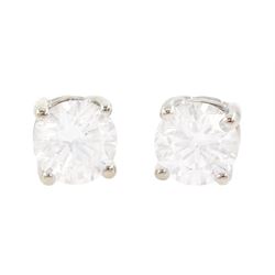 Pair of 14ct white gold round brilliant cut diamond screw back stud earrings, total diamond weight approx 0.30 carat