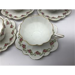 Shelley Late Foley part tea service, pattern number 10137, decorated with roses, comprising eleven teacups and twelve saucers, milk jug, sugar bowl, twelve side plates and two sandwich plates (39)