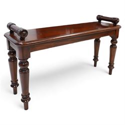 Victorian design mahogany hall bench or window seat, the moulded rectangular top mounted by turned bolster ends, on turned supports