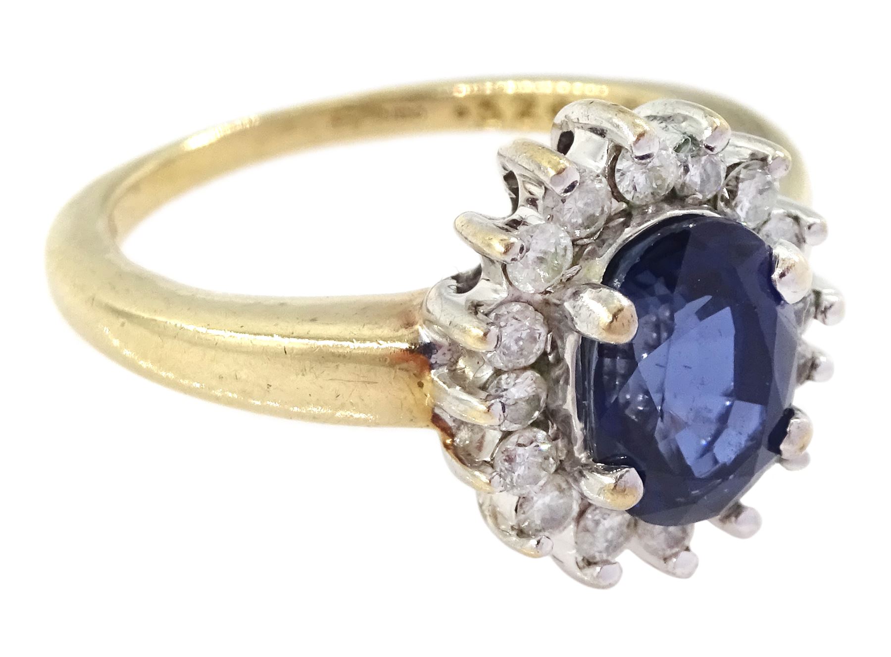 9ct gold oval cut sapphire and round brilliant cut diamond cluster ring, hallmarked