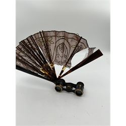 Early 20th century Asprey & Co opera glasses, with simulated tortoiseshell body and handle, the handle opening to reveal a chiffon fan, finely worked with sequins, stamped Asprey & Co London