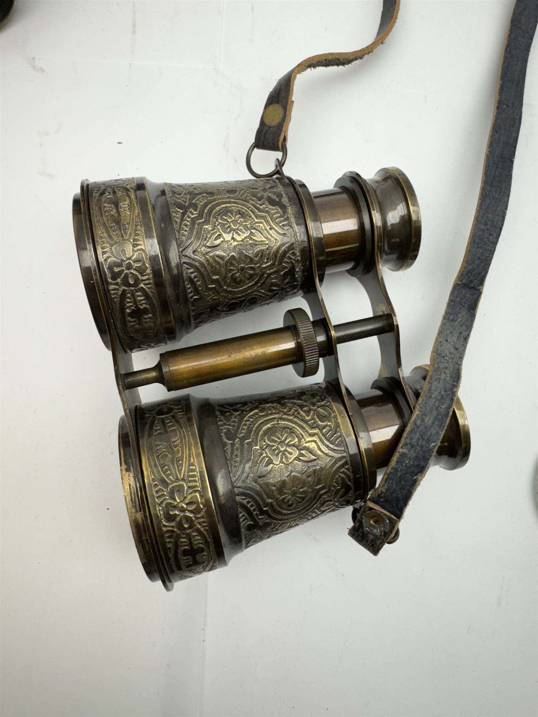 Pair of brass and mother of pearl opera glasses, together with a gilt metal pair of racing binoculars and one other pair, etc 