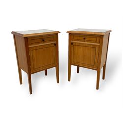 Pair of contemporary cherry wood bedside cupboards, inset glass top in moulded frame, fitted with single drawer over cupboard, on square tapering supports 