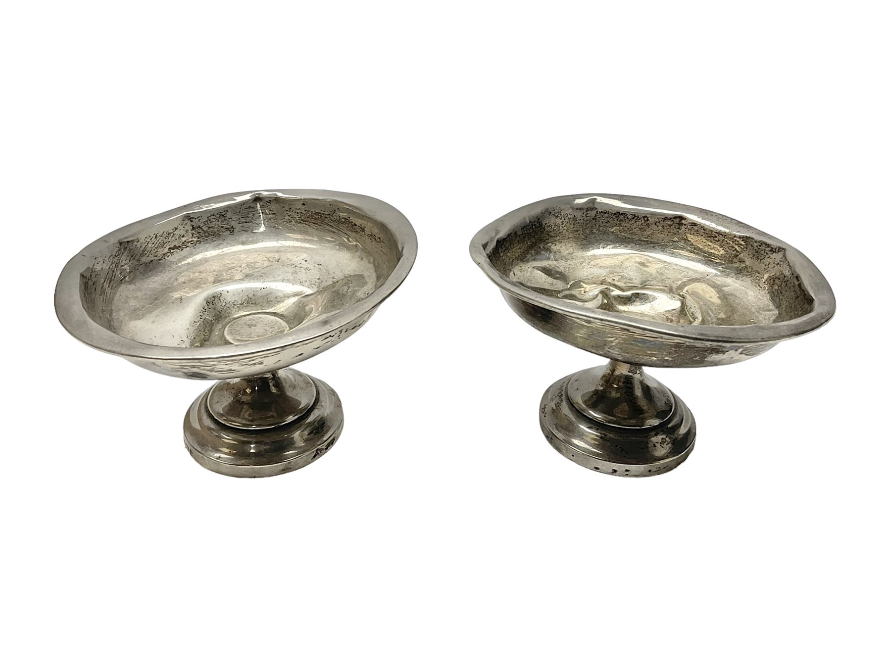 Pair of silver bon bon dishes, with weighted bases, hallmarked 