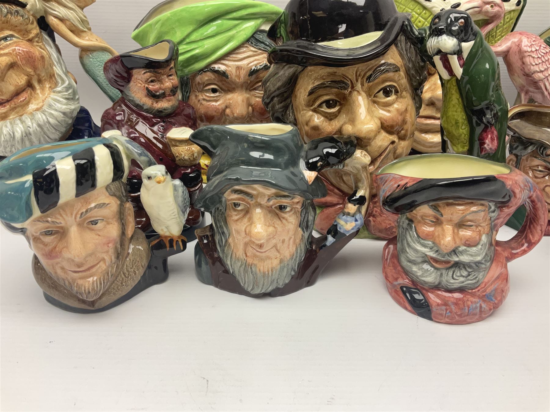 Twenty two Royal Doulton toby and character jugs, including Ugly ...