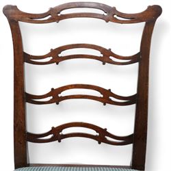 Set of four 19th century Chippendale design dining chairs, waived and pierced ladder back, upholstered in striped fabric, on square supports united by H-stretchers 