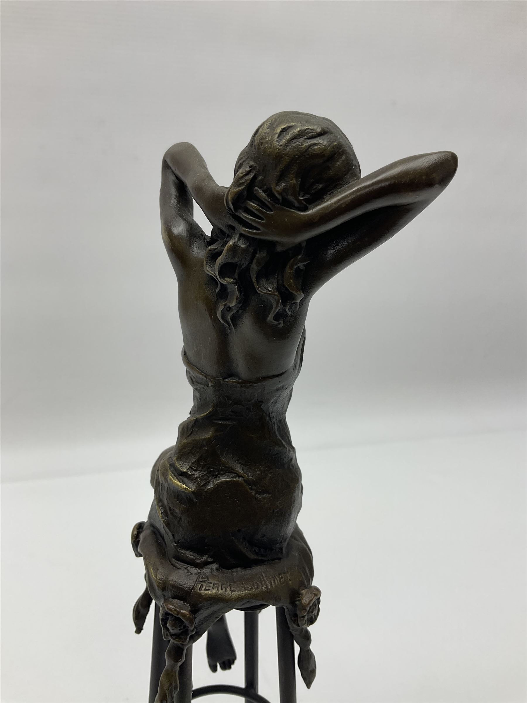 Art Deco style bronze modelled as a female figure seated upon a chair, after 'Pierre Collinet', H28cm