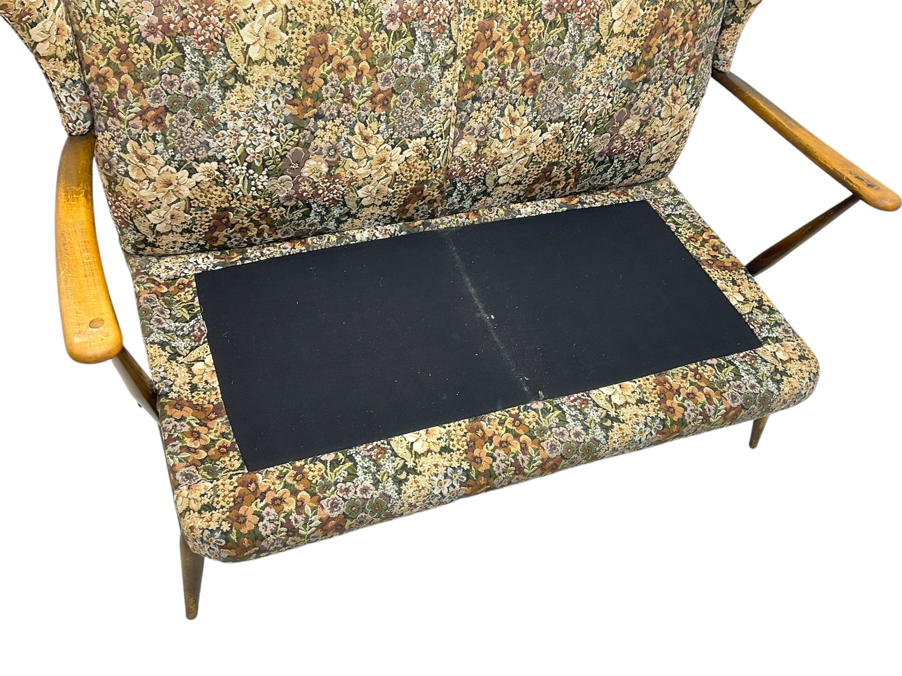 Lucian Ercolani for Ercol - mid-20th century beech and elm 'Windsor 203' two-seat sofa, wingback design upholstered in floral pattern over sprung seat and backrest, open curved arms, on splayed supports with stretchers (W133cm, D87cm, H90cm); matching easy chair (W70cm, D97cm, H82cm)