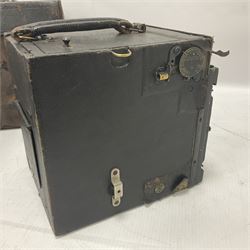 Early 20th century Adams and Co 'Videx' folding plate camera, in original leather carrying case, with various quarter plates