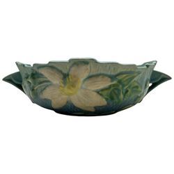 Roseville pottery twin handled bowl, decorated with clematis on a blue ground, marked ‘Ros...