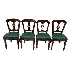 Matched set of twelve Victorian mahogany dining or boardroom chairs, the shaped cresting rail decorated with scrolled decoration, upholstered drop-on seats upholstered in green fabric, on turned supports  