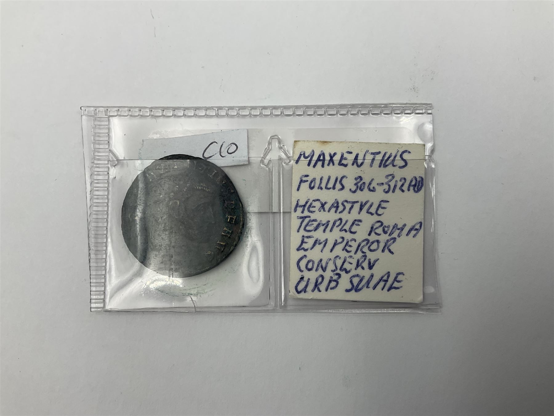 Roman Imperial Coinage, Maxentius (306-312AD) bronze follis, obv. Maxentius facing right, rev. Roma holding sceptre and globe seated within hexastyle temple 