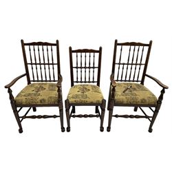 Set of six (4+2) 20th century oak spindle back dining chairs, with upholstered drop-on seat cushions, turned supports joined by turned stretchers