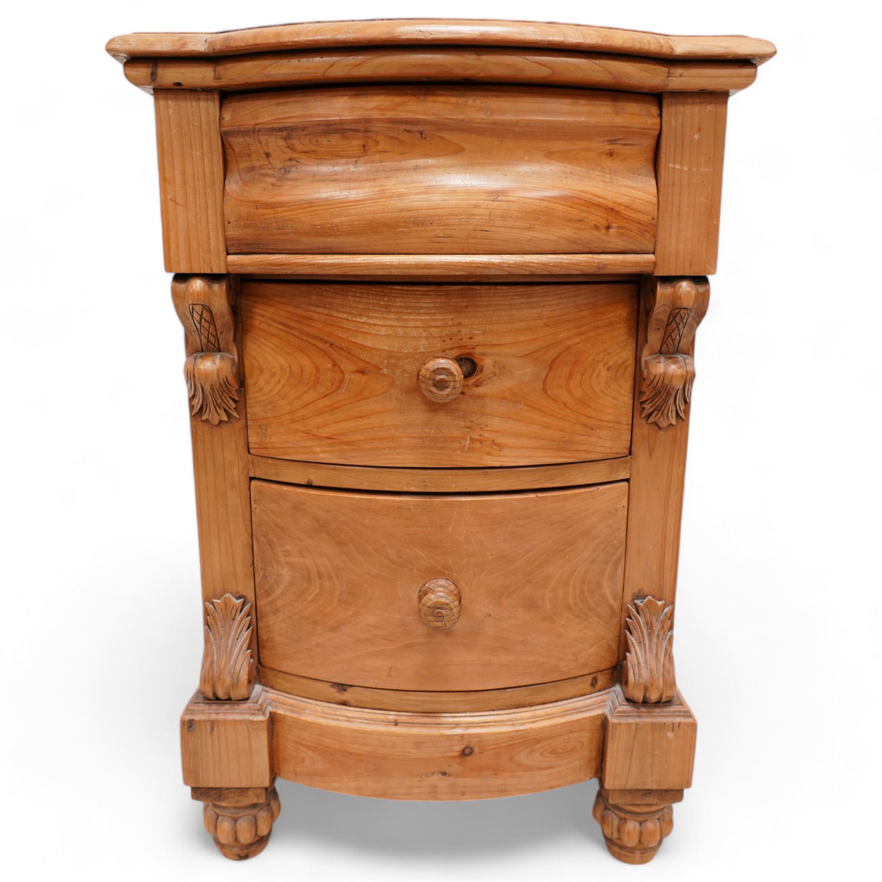 Keenpine - Victorian design bow-front pine bedside chest, cushion drawer over two graduating drawers flanked by scrolling acanthus uprights, on lobed feet