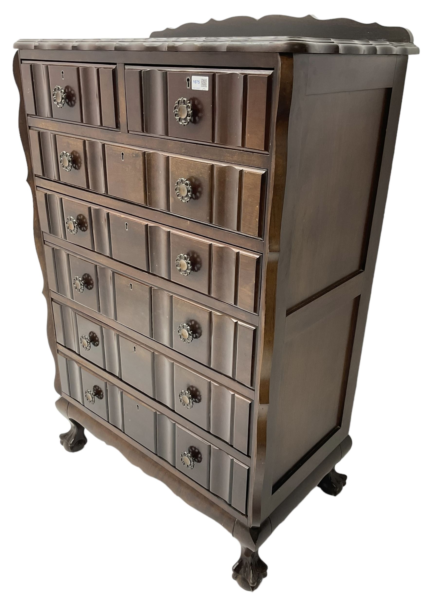 Early 20th century Dutch design mahogany chest, raised back over shaped top, fitted with two short and five long drawers, raised on ball and claw feet