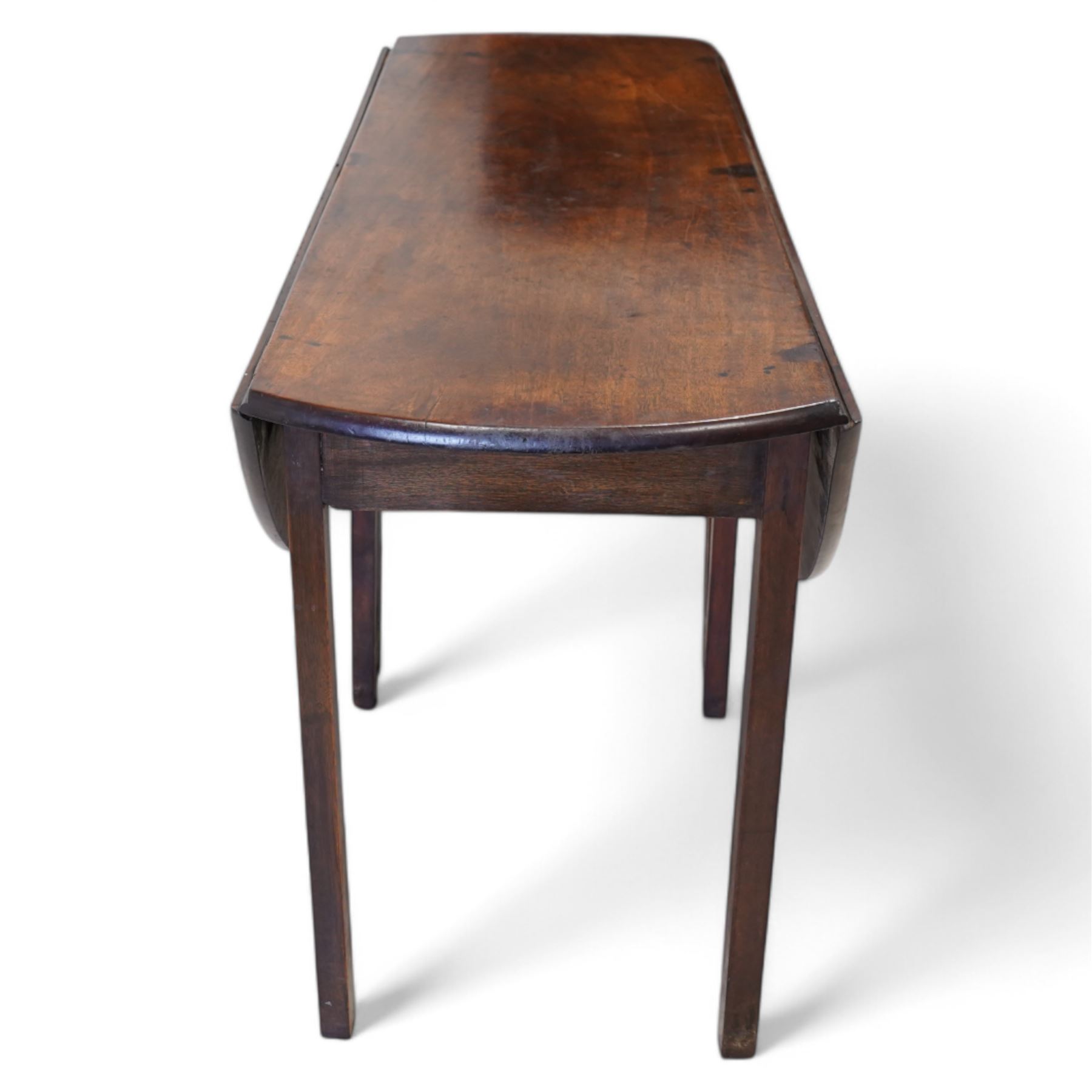 Late 18th century mahogany dining table, oval drop-leaf top on double gate-leg action base, on square supports 