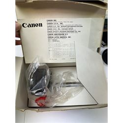 Canon T60 camera body serial no 25230455 together with a collection of Canon camera accessories, including zoom lenses, bellows, etc 