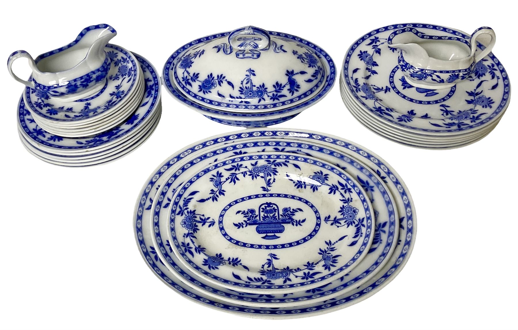 Mintons Delft blue and white dinner wares, to include three graduating oval platters, six dinner plates, six dessert plates and six side plates, tureen with cover and two sauce boats