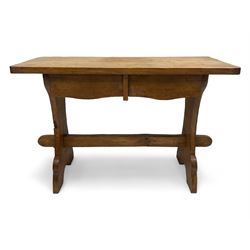 Gnomeman - oak side table, rectangular adzed top over two drawers, on shaped end end supports united by pegged stretcher, carved with gnome signature, by Thomas Whittaker, Littlebeck 