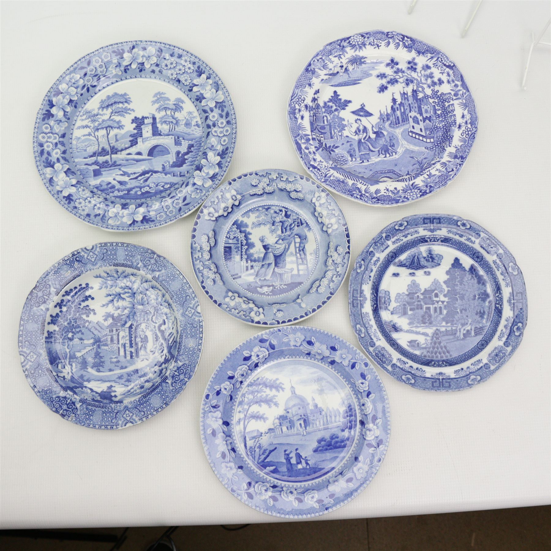 Early 19th century blue and white transfer printed plates including J & R Clews 'Wingfield Castle Suffolk', Copeland & Garrett New Blanche, Brameld 'Apple Collectors, 'Queen of Sheba', Spode 'Sarcophagi & Sepulchres', 'Ponte Rotto' and others (15)