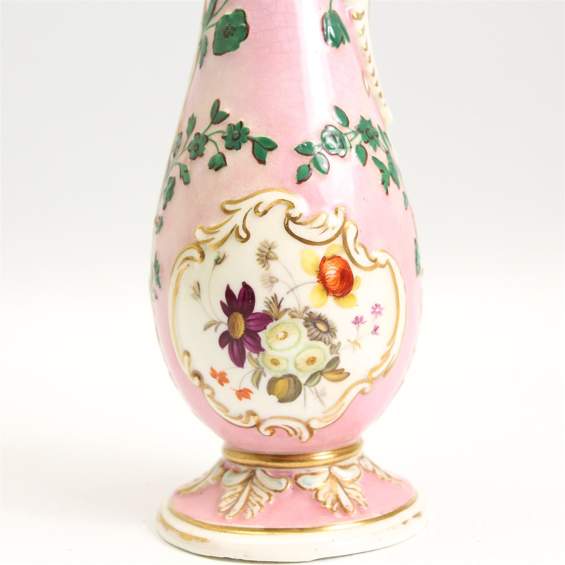 19th century porcelain scent or essence bottle, possibly by Henry & Richard Daniel, of baluster form, relief moulded with leaves and flowers and painted with panels of flowers,  with associated conical form stopper, H30.5cm together with a 19th century French scent bottle and stopper (2)