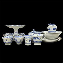 Extensive tea and dinner service of Booths and Cauldon dragon pattern, including, teapots, coffee pots, jugs, toast racks, bowls, dinner plates, platters, soup tureen etc 