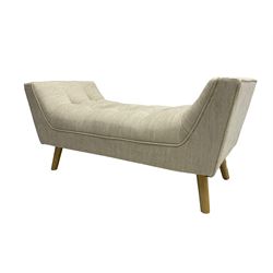 Contemporary U-shaped window or bed stool, upholstered in buttoned neutral fabric