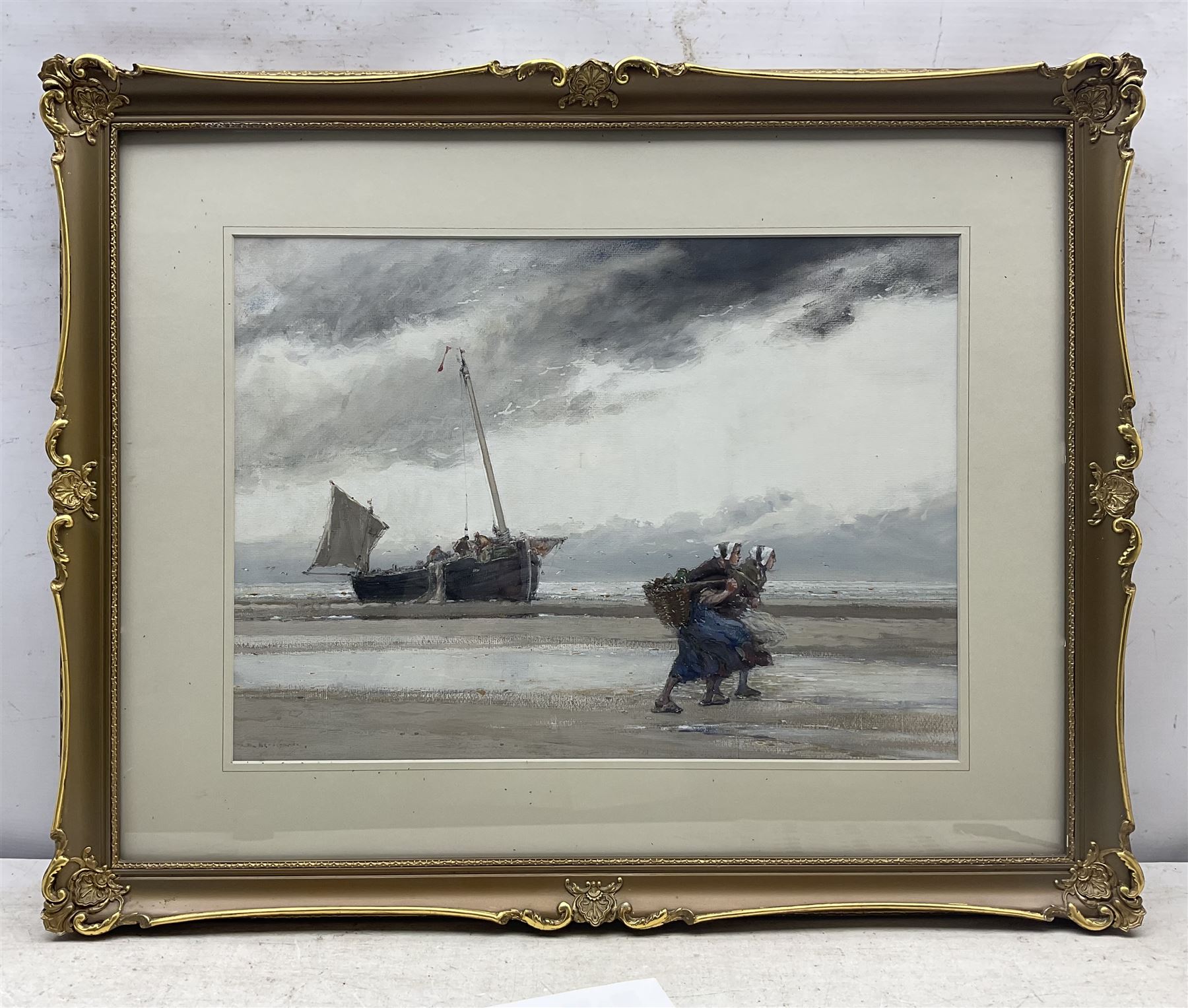 English School (Early 20th Century): Dutch Fisherwomen on a Blustery Beach, watercolour and gouache indistinctly signed 36cm x 49cm 