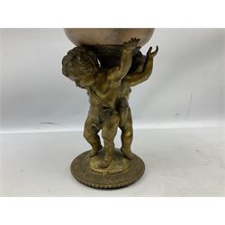 Brass centrepiece modelled as two cherubs supporting a marble bowl, stood upon a foliate design base, H32cm