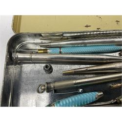 Collection of silver and other propelling pencils, including guilloche enamel example and oddments 