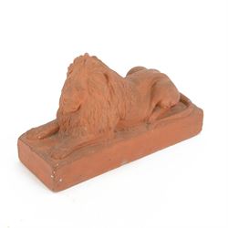 Cast terracotta figure of a recumbent lion, H18cm