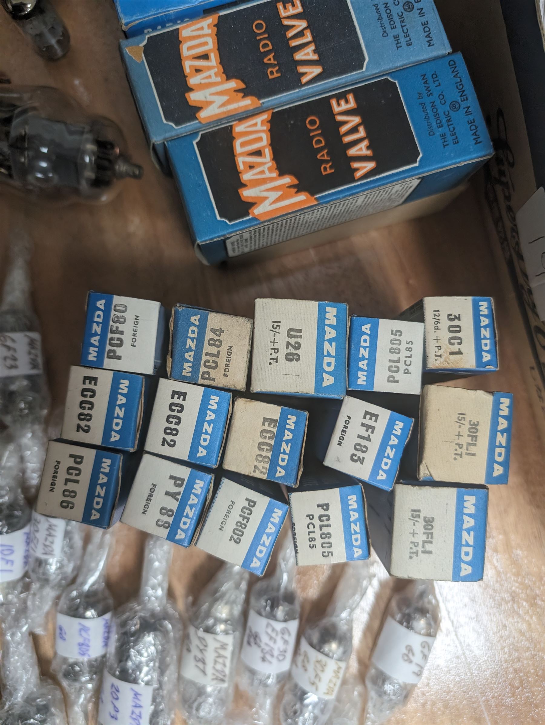 Large collection of Mazda thermionic radio valves/vacuum tubes, including boxed examples and loose bubble wrapped and identified examples