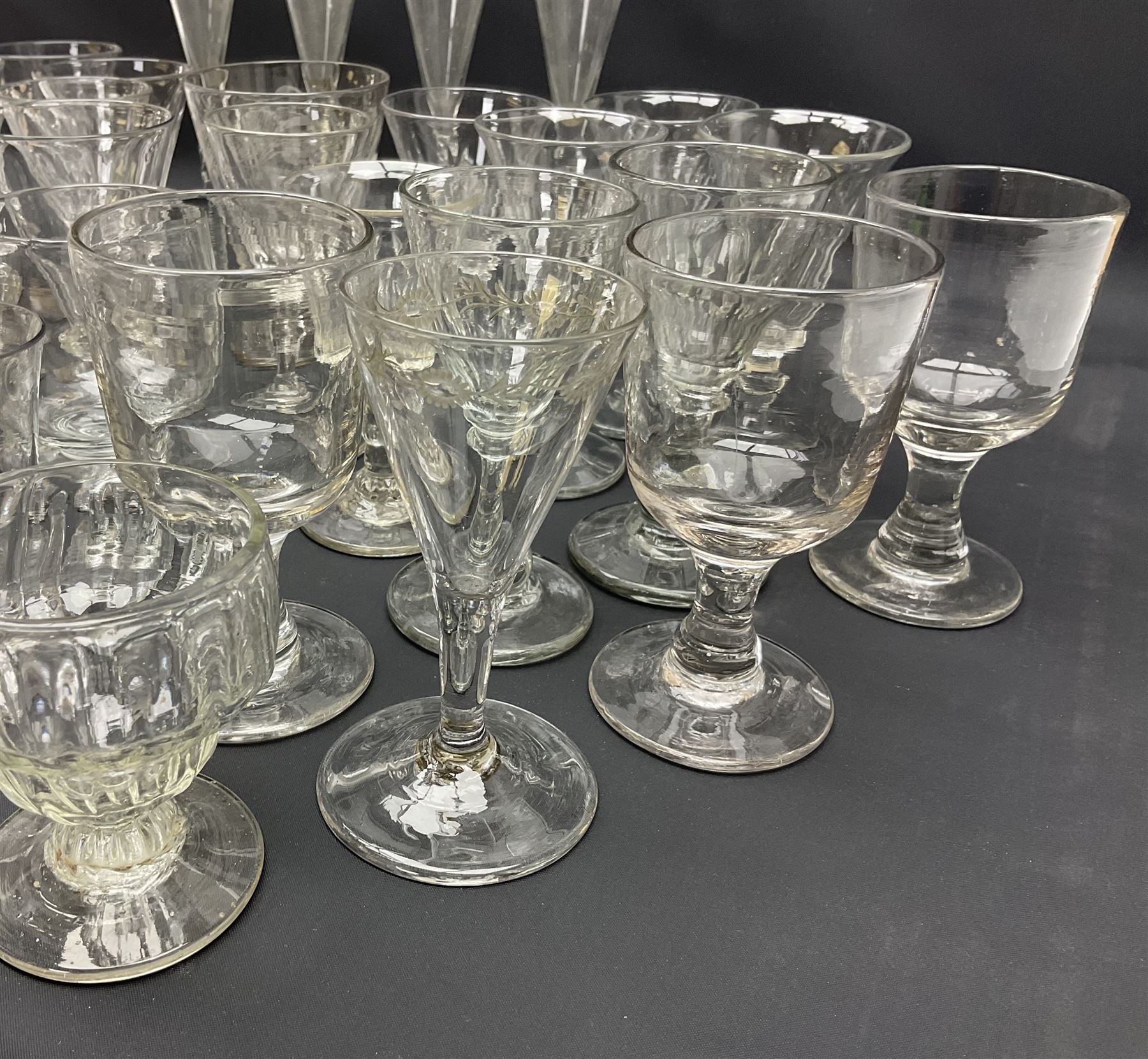 Collection of 18th century and later glassware, including set of three with twist stems and etched and fluted examples