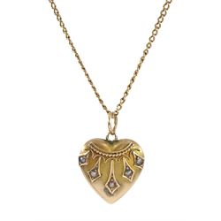 Early 20th century 9ct gold seed pearl and applied wirework heart pendant, on 10ct gold chain necklace