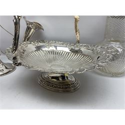 Silver plated three branch epergne, together with a silver plated cut glass claret jug, and silver plated embossed swing handled basket, epergne H30.5cm