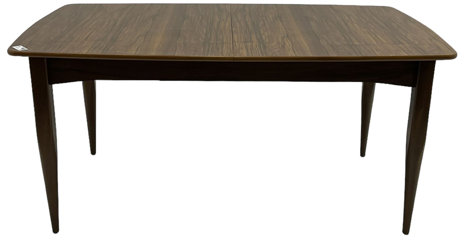 Mid-20th century figured walnut extending dining table, pull-out action with fold-out leaf, on tapering supports 