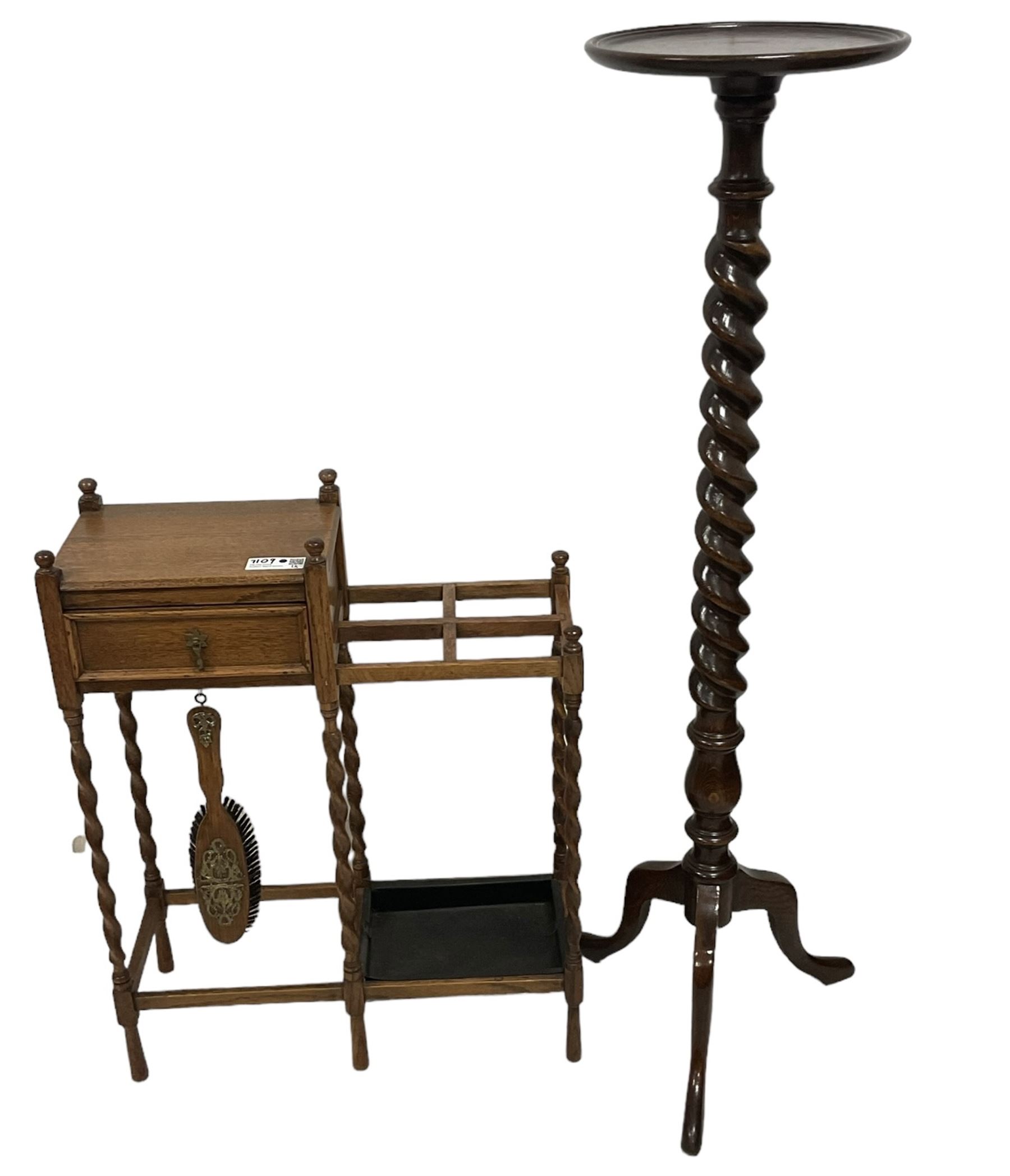 Edwardian oak spiral turned torchere stand, circular dished top, on tripod base (W31cm H125cm); Edwardian oak hallstand, fitted with single drawer, four sectional umbrella or stick stand over drip tray, with associated brush (W60cm H76cm) 