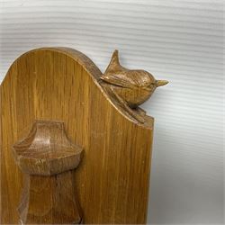 Wrenman - set of three oak two-branch wall light sconces, shaped plaque carved with wren signature, faceted half column with two projecting shaped branches, by Bob Hunter, Thirlby, Thirsk