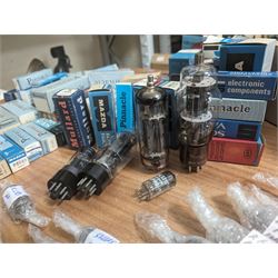 Large collection of thermionic valves/vacuum tubes, by various makers, mostly wrapped in bubble wrap with identifying stickers, together with a collection of empty valve boxes including Pinnacle, Mullard etc