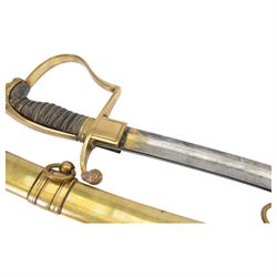 German Saxon 1st Empire Light Cavalry officer's sword c1820s, the 79cm clipped curving blade engraved with the crest of Hanover and various battle trophies with traces of blueing and gilding, brass hilt with knucklebow, foliate square langets, ornate downswept quillon, wire-bound fish skin grip with lion's head pommel; in brass scabbard with two suspension rings L95cm overall