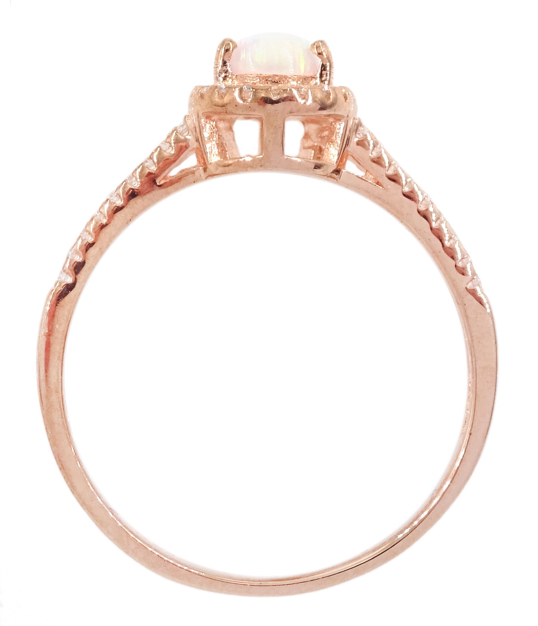 Rose gold on silver pear cut opal and cubic zirconia  cluster ring, stamped 925