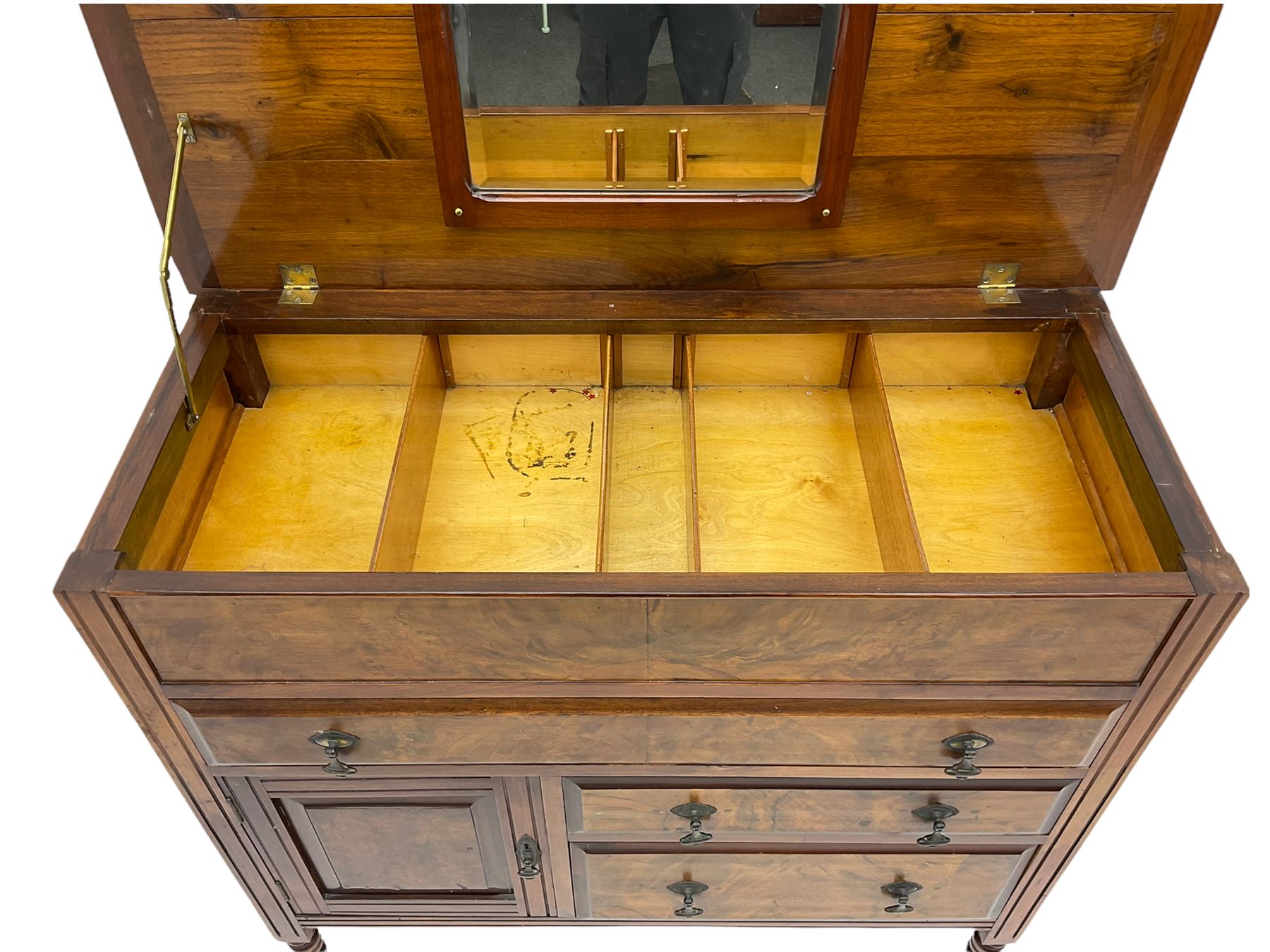 Edwardian walnut gentleman's tallboy, moulded hinged lid enclosing divisions, long drawer over two short drawers and panelled cupboard, turned supports terminating at ceramic castors