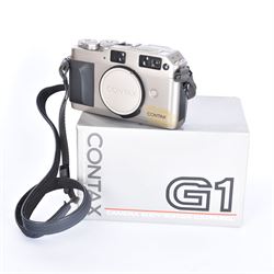 Contax G-1 rangefinder camera body, serial no. 077101, boxed with strap