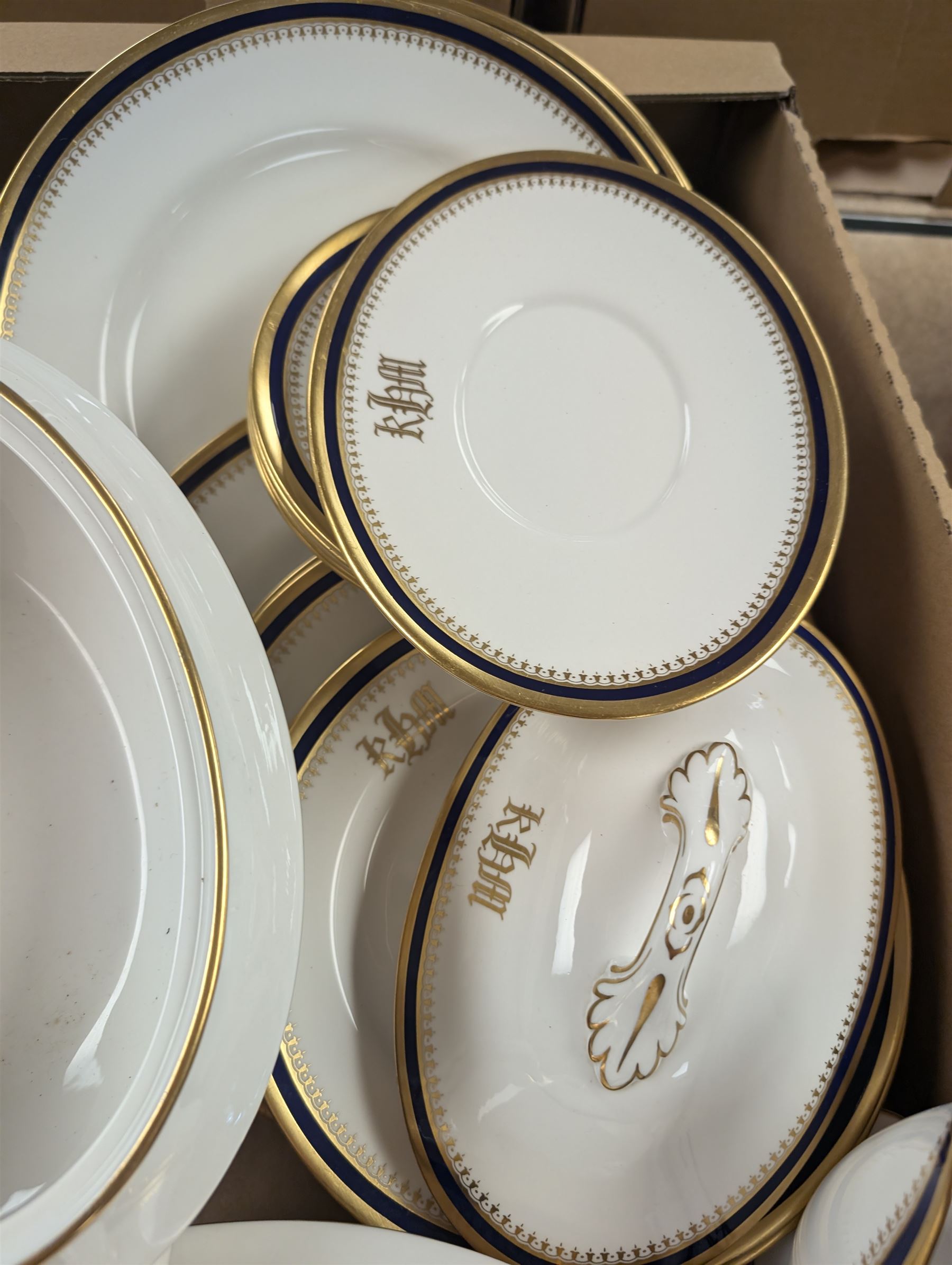 Spode Knightsbridge pattern part dinner service, comprising sauce boat, two tureens, serving platter, dinner plates, side plates and dessert plates, specially commissioned with gilt initials to each piece, with printed mark beneath