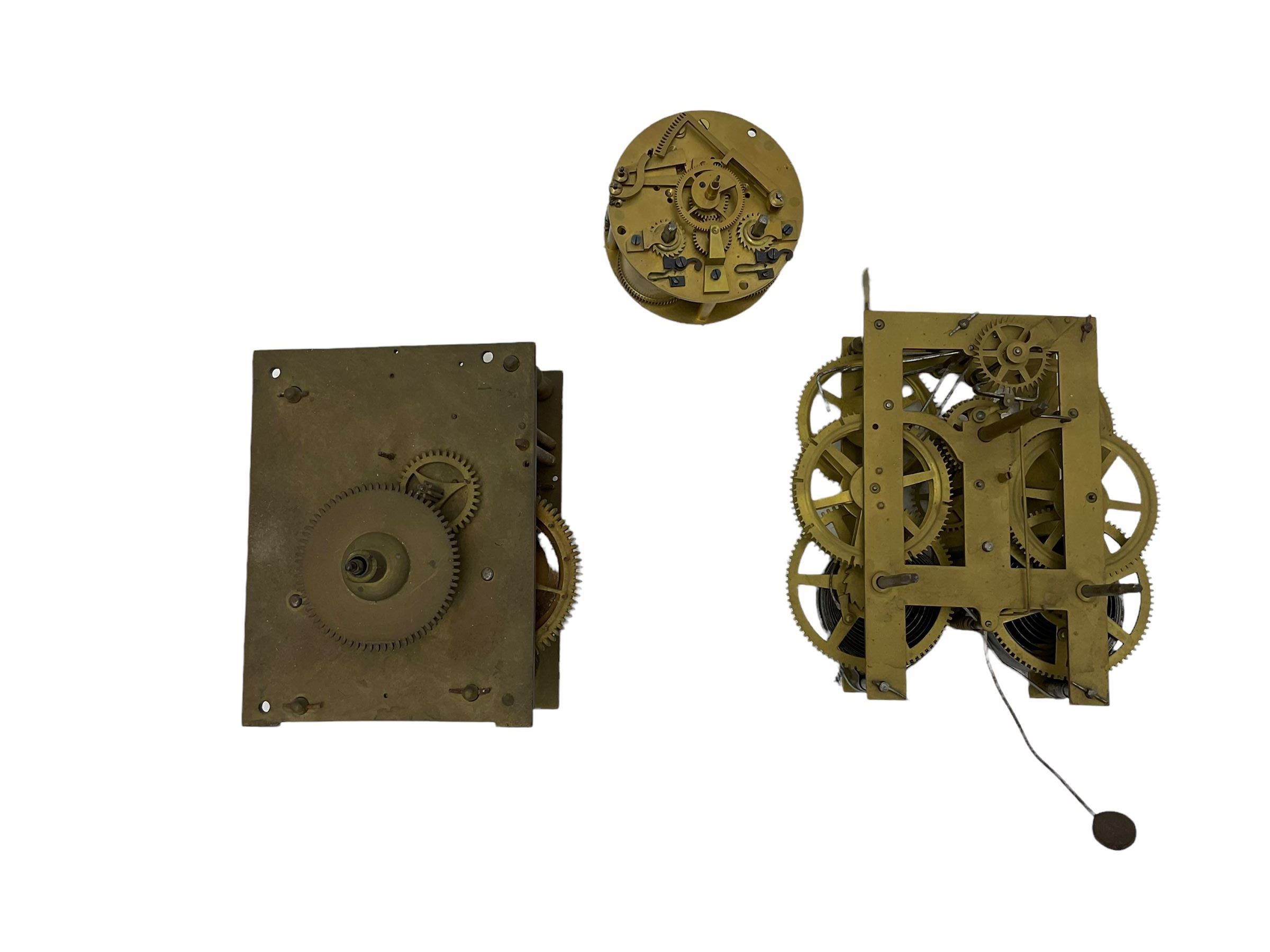 An English 19th century 30 hour longcase movement with a 19th century American spring driven wall clock movement and a French 19th century mantle clock movement.