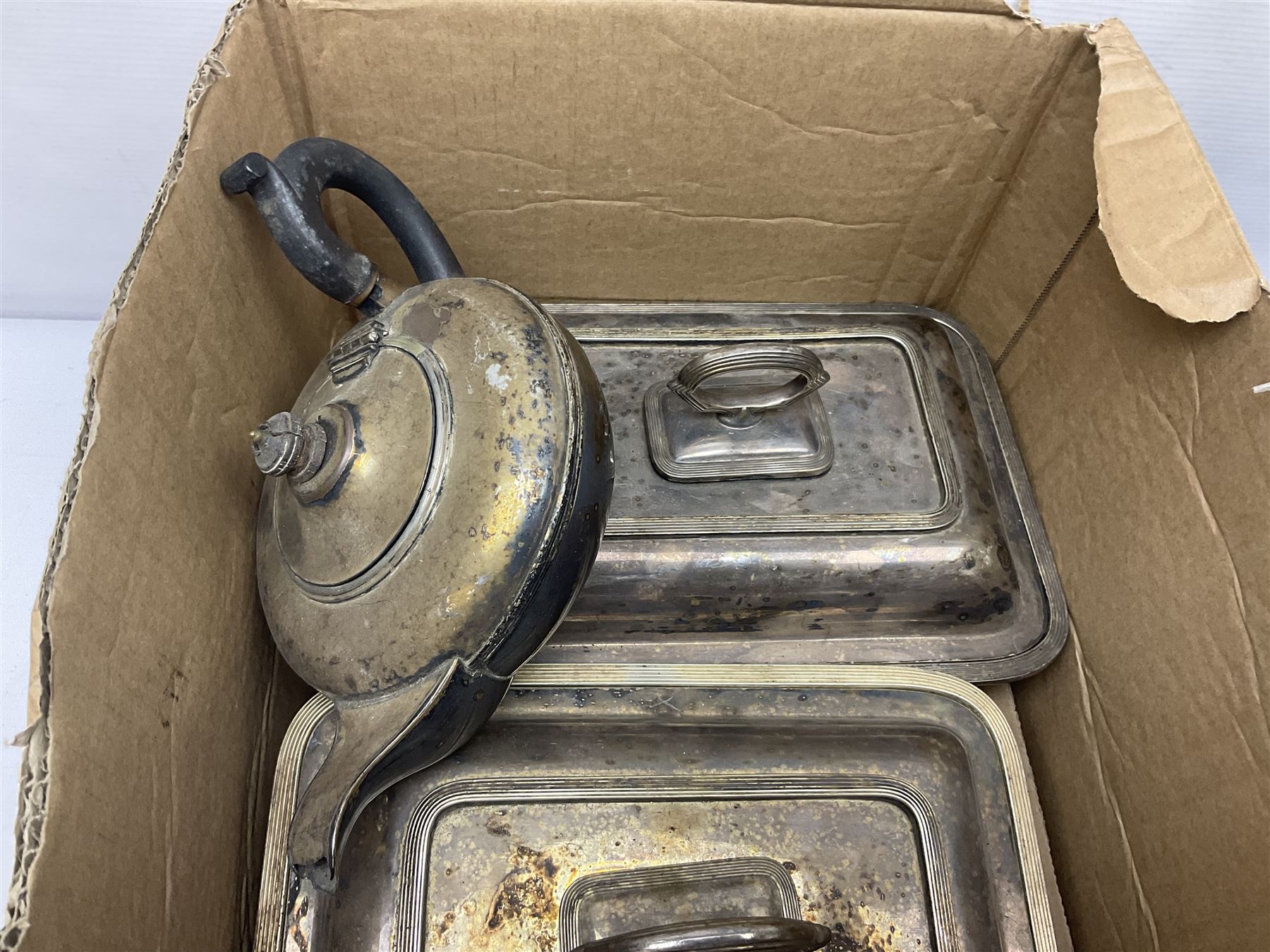 Silver mounted hand mirror and glass vanity bottles/jars with silver caps, all hallmarked, together with silver plated teapot, serving dishes and glass hip flask